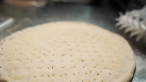 Preparing a pizza Rolling dought Stock Footage 240641178