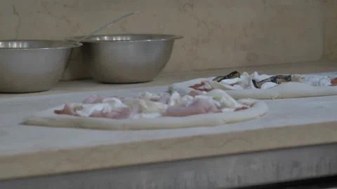 Preparing pizzas Stock Footage 305986313