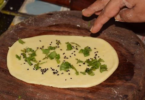 Preparing plain naan Stock Photos