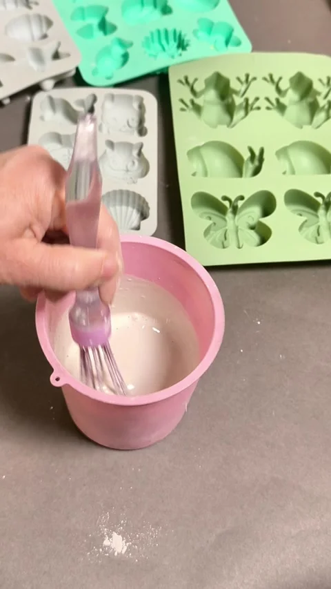 Preparing plaster mixture in cup, pouring powder into water, Stock Footage 342263746