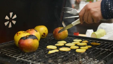 Preparing potato chips and cooking apple closeup during family BBQ grill outside 스톡 동영상 91437096