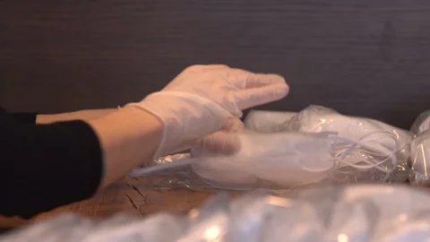 Preparing protective masks for the local community during the covid-19 pandemic Stock Footage 127652942