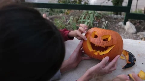 Preparing pumpkin for Halloween. Stock Footage 231613797