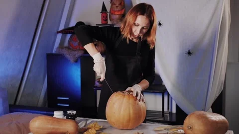 Preparing a pumpkin for Halloween: the process of carving a pumpkin. Stock Footage 321141015