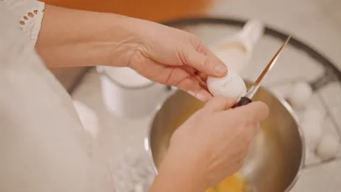 Preparing pumpkin pie batter vividly. Kitchen atmosphere with active baking Stock Footage 346394148