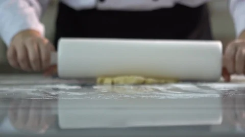 Preparing ravioli dough with a roller Stock Footage 104681433
