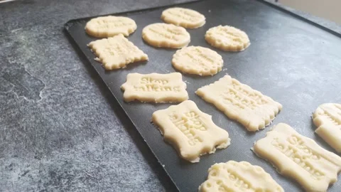 Preparing of raw handmade rude cookie dough naughty quote words insult Stock Footage 171104979