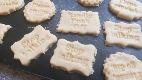 Preparing raw homemade rude cookie dough naughty quote words insult left Stock Footage 171103864
