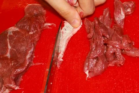 Preparing Raw Meat for Cooking Stock Photos