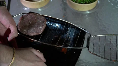 Preparing Raw Meat Patties on Grill Stock Footage 319948981