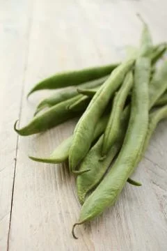 Preparing raw runner beans Stock Photos
