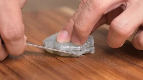 Preparing Raw Shrimp Peeling and Deveining Seafood Cleaning Close-Up Stock-Footage 328682555