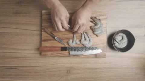 Preparing Raw Shrimp Peeling and Deveining Seafood Cleaning Close-Up Stock Footage 328682556