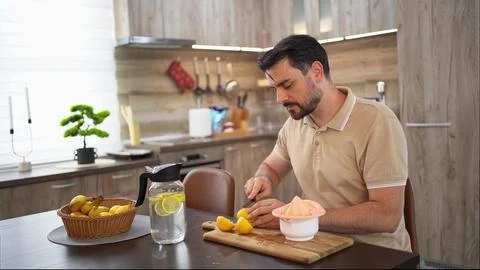 Preparing a refreshing lemon dessert in a cozy kitchen Stock Photos