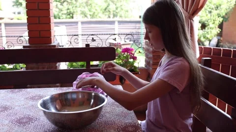 Preparing refreshing lemonade outdoors on a sunny day with fresh ingredients Stock Footage 297358195