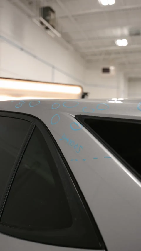 Preparing to Repairing car after Hail Damage in car body shop. Vertical Stock Footage 332183254