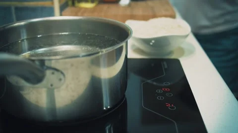 Preparing rice in modern kitchen Stock Footage 59948551