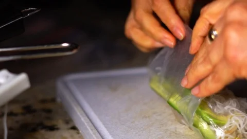 Preparing Rice Noodle Spring Rolls in Slow Motion Closeup Stock Footage 125339286