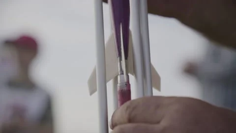 Preparing a rocket model for launch. Slow motion Stock Footage 163778420