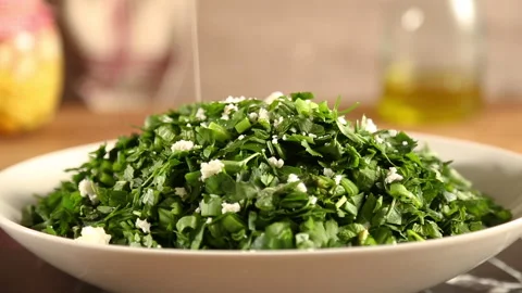 Preparing rocket salad with white cheese Stock Footage 277771329