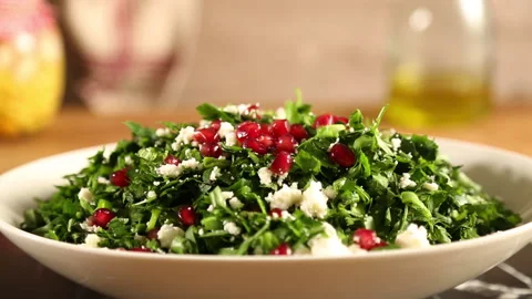 Preparing rocket salad with white cheese Stock Footage 277771393