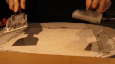 Preparing Rolled Ice Cream on Cold Plate 스톡 동영상 345293001