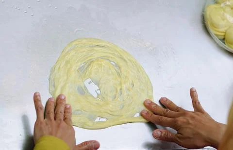 Preparing Roti (Indian Flat Bread) Stock Photos