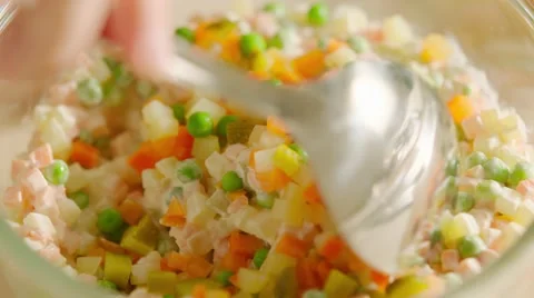 Preparing russian salad Stock Footage 64214637