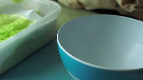 Preparing a salad bowl Stock Footage 128002977
