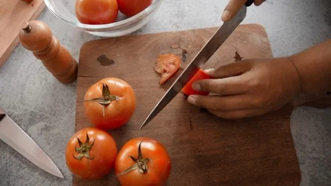Preparing salad with fresh ingredients, on a gray table Stock Footage 272181585