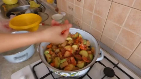 Preparing salad with various vegetables Video stock 160186476