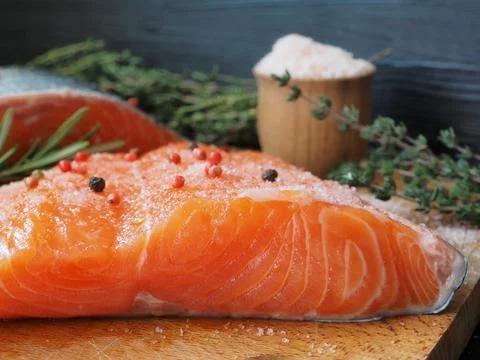 Preparing salted salmon Stock Photos