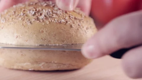Preparing sandwich on breakfast table full of vegtables.  Vídeos de archivo 154458735