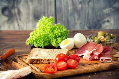 Preparing sandwiches Stock Photos