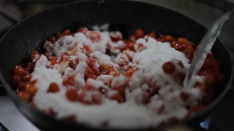 Preparing a Sauce of Aromatic Red Chili Stock Footage 129340328