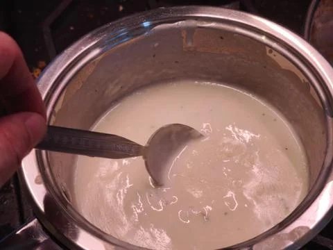 Preparing sauce in pan Stock Photos