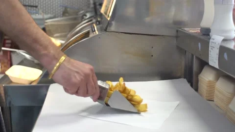 Preparing Sausage & Chips | Chip Shop Stock Footage