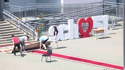 Preparing for school graduation 2020 in Belarus. Workers lay in front of the  Stock Footage 132412612