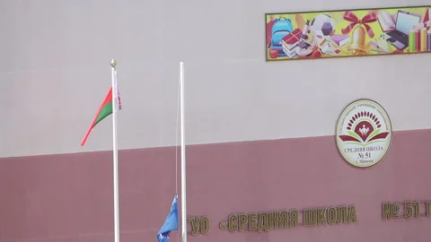 Preparing for the school graduation celebration. The flag of the country and  Stock Footage 132413079