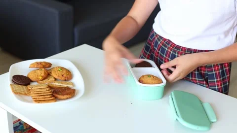Preparing for School: Packing a Lunchbox Stock Footage 297863325