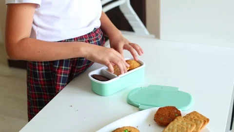 Preparing for School: Packing a Lunchbox Stock Footage 297863538