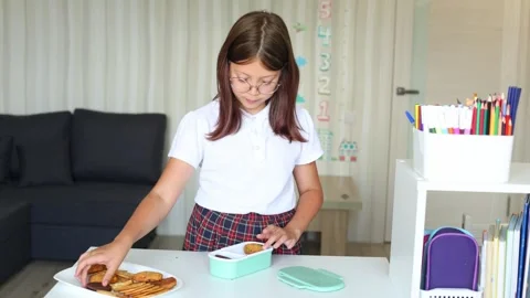 Preparing for School: Packing a Lunchbox Stock Footage 297863853
