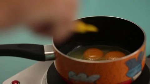 Preparing scrambled eggs Stock Footage 132145440