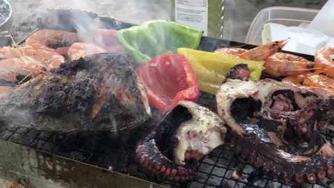 Preparing seafood on a small barbecue grill Stock Footage 151329358