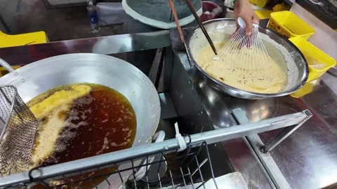 Preparing Sesame Banana in Batter Before Deep Frying at Vietnam Night Market Stock Footage 325075014