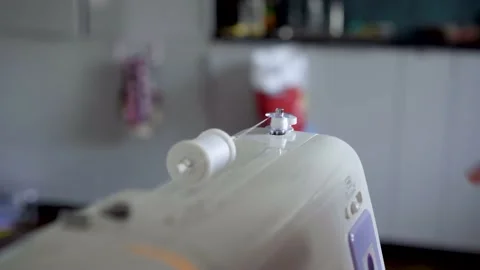 Preparing the sewing machine for work. Close up view. Stock Footage 162848447