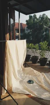 Preparing a shoot with white canvas background in the morning Photos
