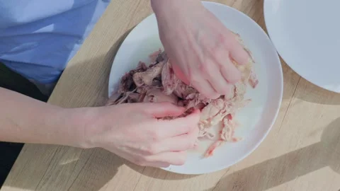 Preparing Shredded Chicken for Cooking and Meal Prep A Deliciously Simple Guide Stock Footage 318558346