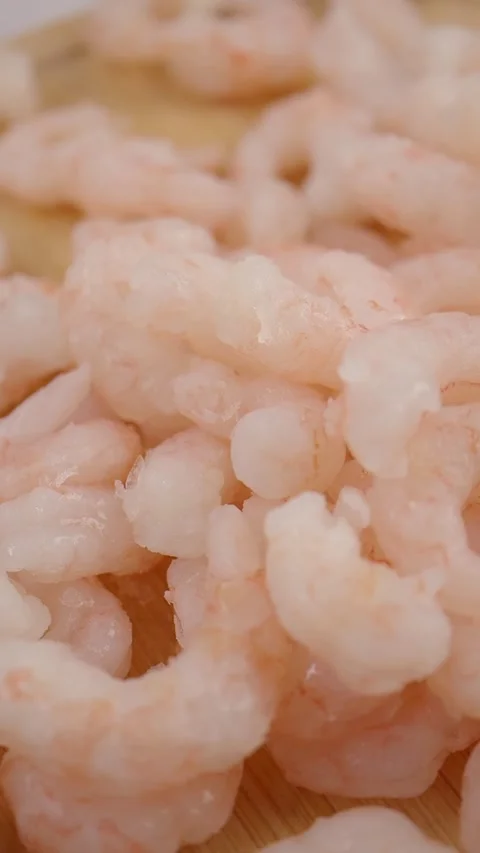 Preparing shrimp for cooking in a kitchen Stock Footage 341068683