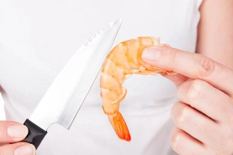 Preparing a shrimp. Stock Photos